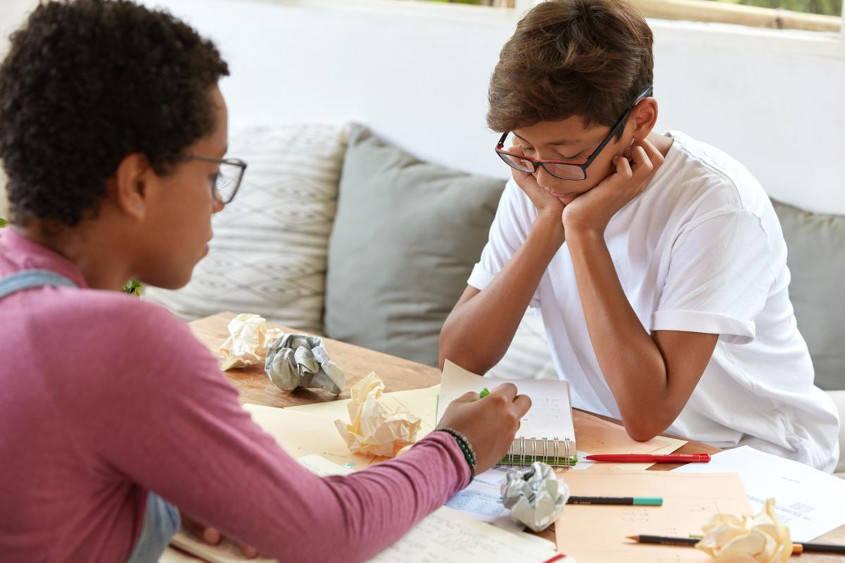 A psychologist giving an ADHD diagnosis to a boy